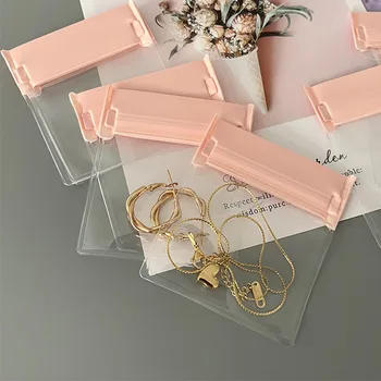 100шт Розовая матовая сумка для хранения ювелирных изделий на молнии, высококачественная прозрачная сумка на молнии, кольца, серьги, ожерелье, упаковка